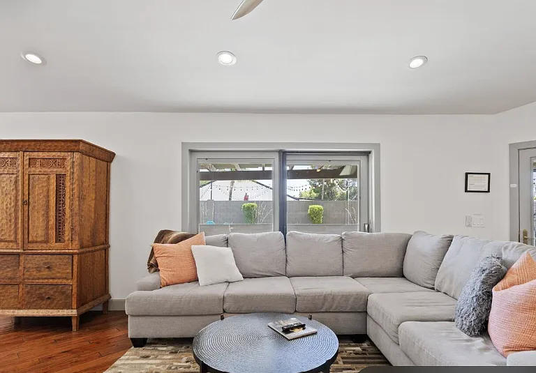 Front door is on right side of picture.
Sliding doors step out onto patio by pool