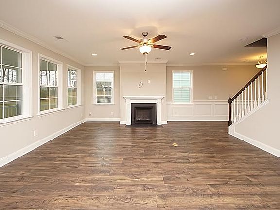 Photos are of a similar home