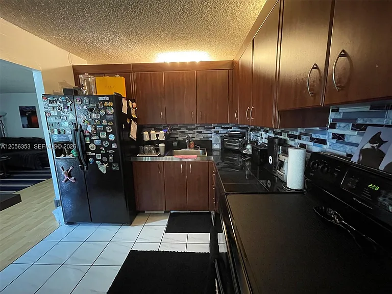 671 NE 195th St #207 — Photo 10