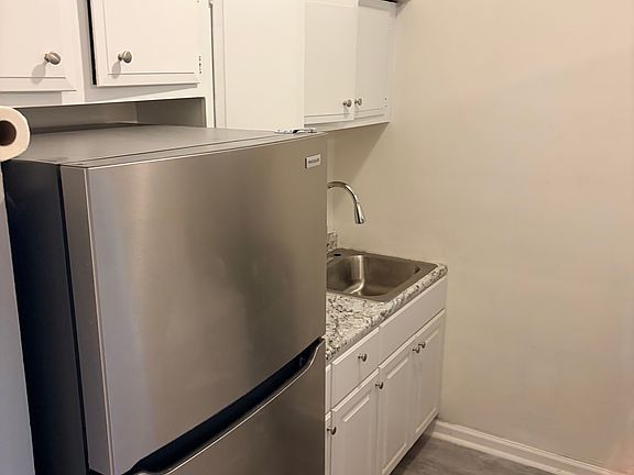 kitchen with brand new refrigerator and stove