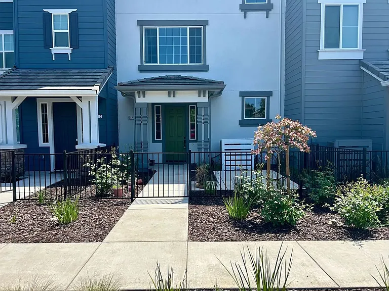 Front of unit with enclosed patio