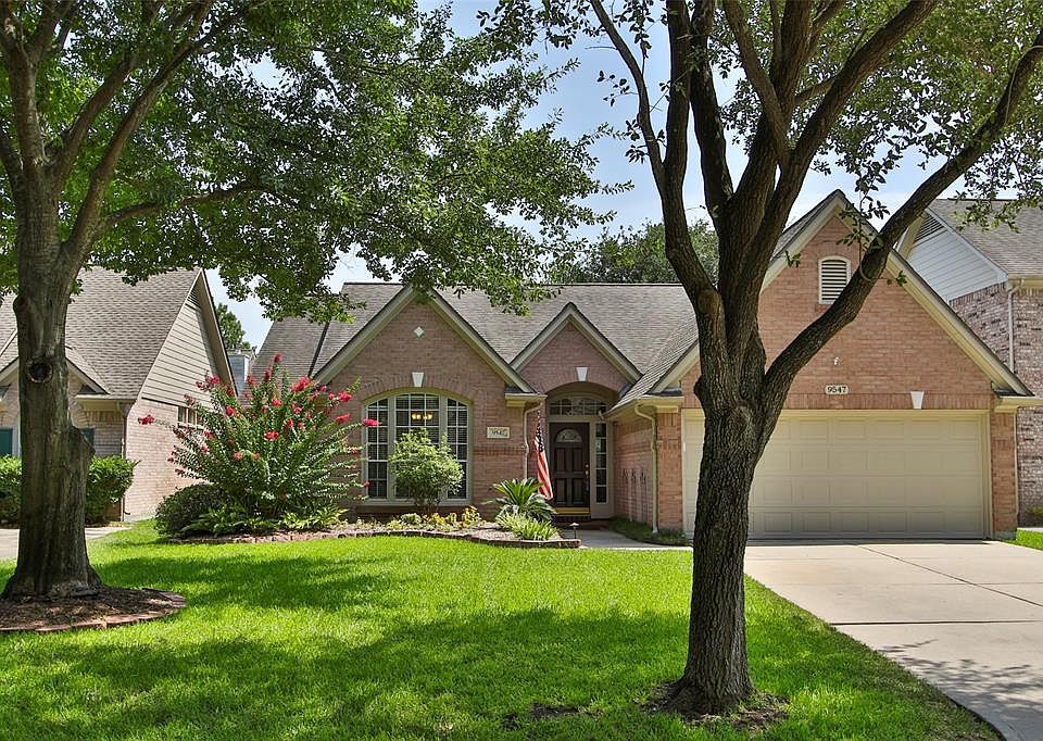 Desirable 1 story home in quiet subdivision with mature trees and lush landscape.