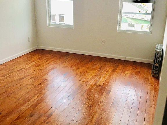 4th image of 11429 Farmers Blvd