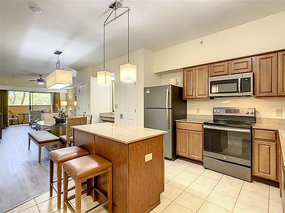 2nd image of 12538 FLORIDAYS RESORT DR #C-211