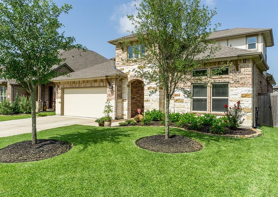 Great curb appeal with manicured landscaping.