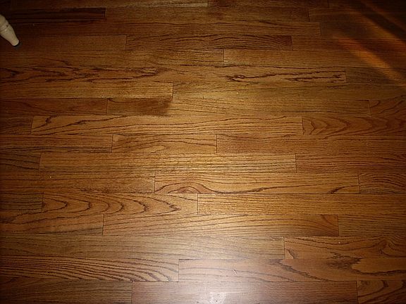 solid red oak flooring in both kitchen and dining
