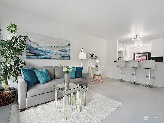 Updates include: New floors, new cabinets, new paint, new bathroom vanity, and new appliances>