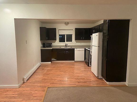 Newly updated kitchen with laminate flooring