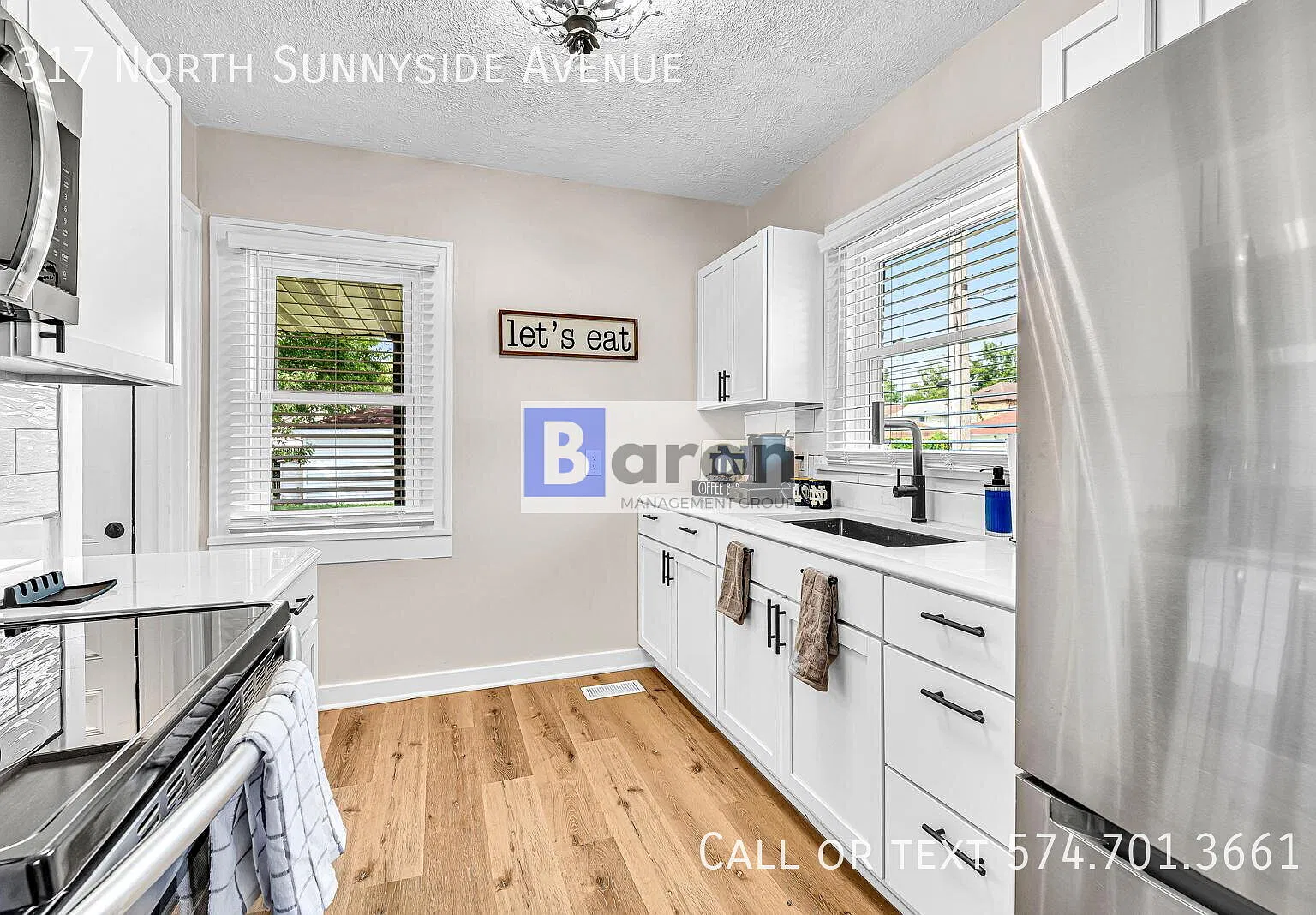 "Charming 4-Bedroom Home with Gleaming Hardwood Floors on North Sunnyside Avenue!" — Photo 1