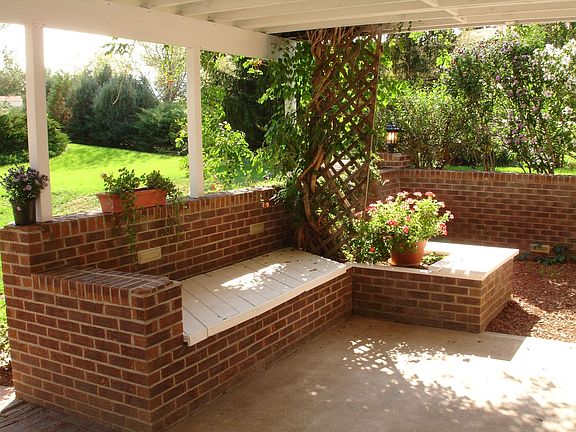 Spacious covered patio and deck above