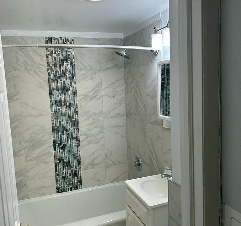 1st image of 1787 E 52nd St #1