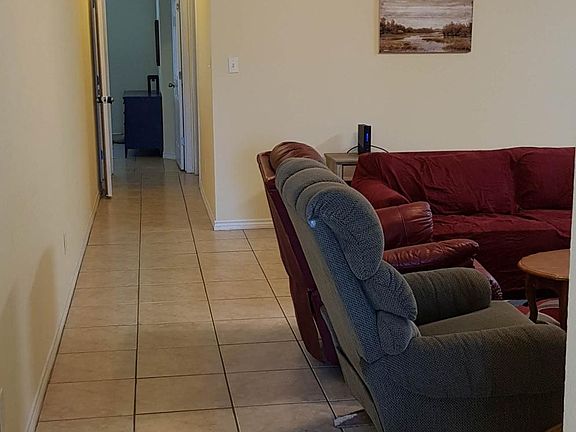 Living Room (18_ x 15_) _ Open to Kitchen & Dining areas, co-ax cable drops, entry coat closet, vaulted ceiling w/ceiling fan