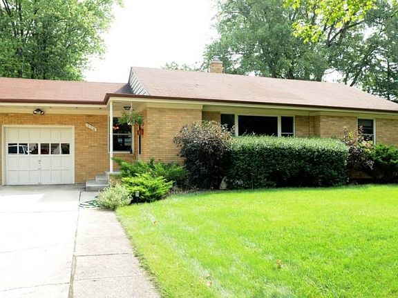 Perfectly maintained 3 bedroom brick ranch. Beautiful new Marvin windows, charming coved ceilings nicely updated. Enjoy the fenced landscaped back yard with perennial garden, Azek deck and relaxing lily pond. Furnace and roof new in 2000, extra insulation added, newer carpet with hardwood flooring underneath, finished recreation room with 1/2 bath and laminate flooring.  Enjoy the fenced yard and extraparking pad on a peaceful and relaxing court
