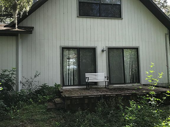 Back of the house with deck.