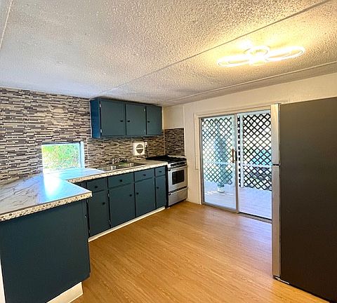 Kitchen with lots of cabinet and counter space.