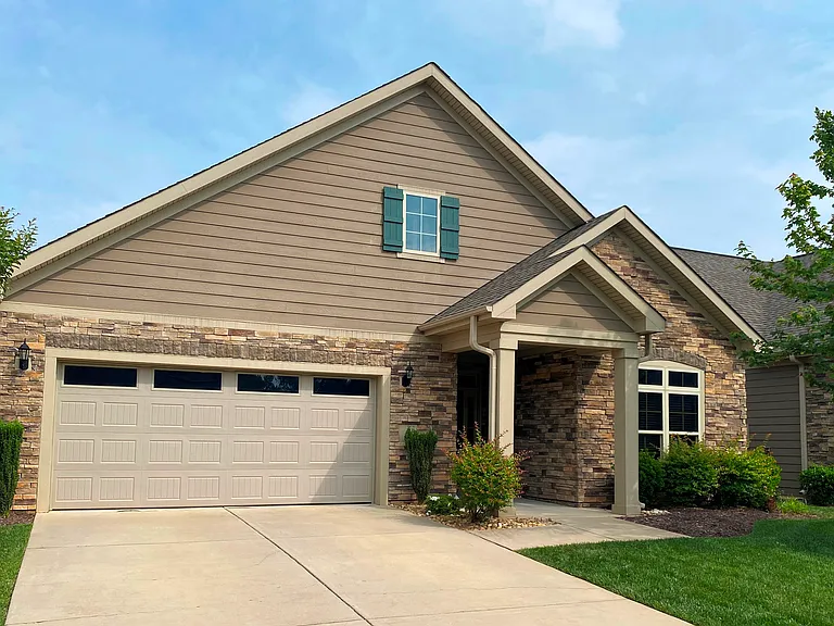 Beautifully done home with stone facing and natural finishes.