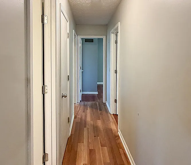 Upper Level Hallway to Bedrooms and Bath Areas