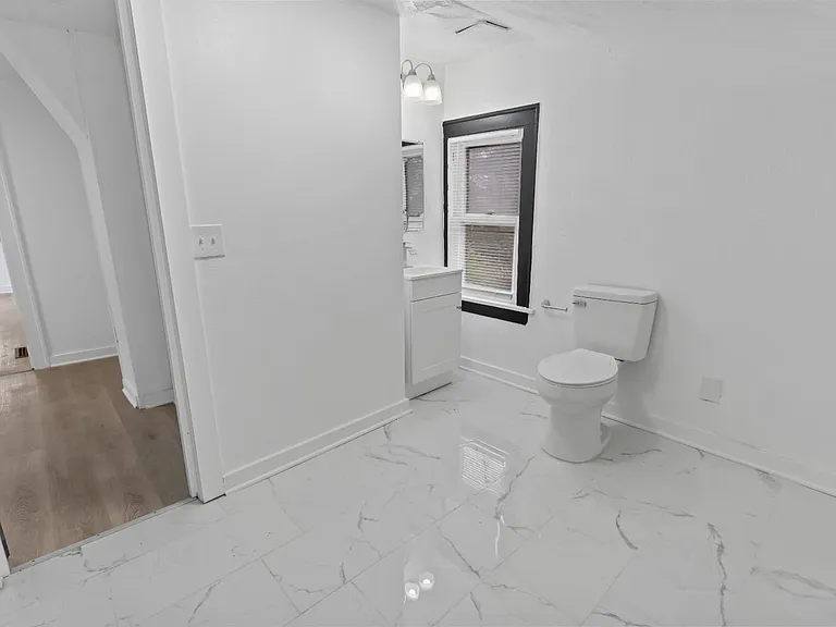 5408 Woodland Ave — Photo 12