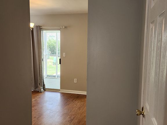 Dining room and screened in porch
& door to 1/2 bathroom