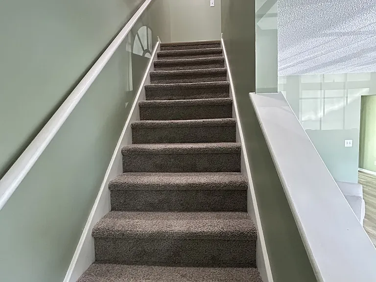 Stairs to 2nd level bedrooms