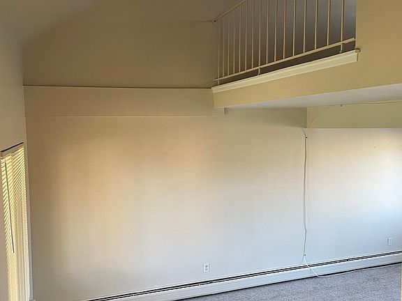 Vaulted ceilings with loft bedroom overlooking livingroom