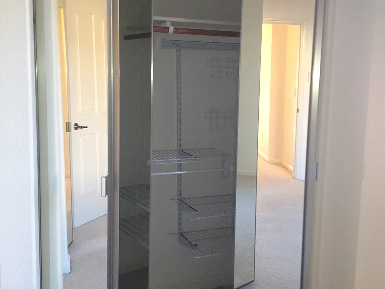 master bed room closet opens wide