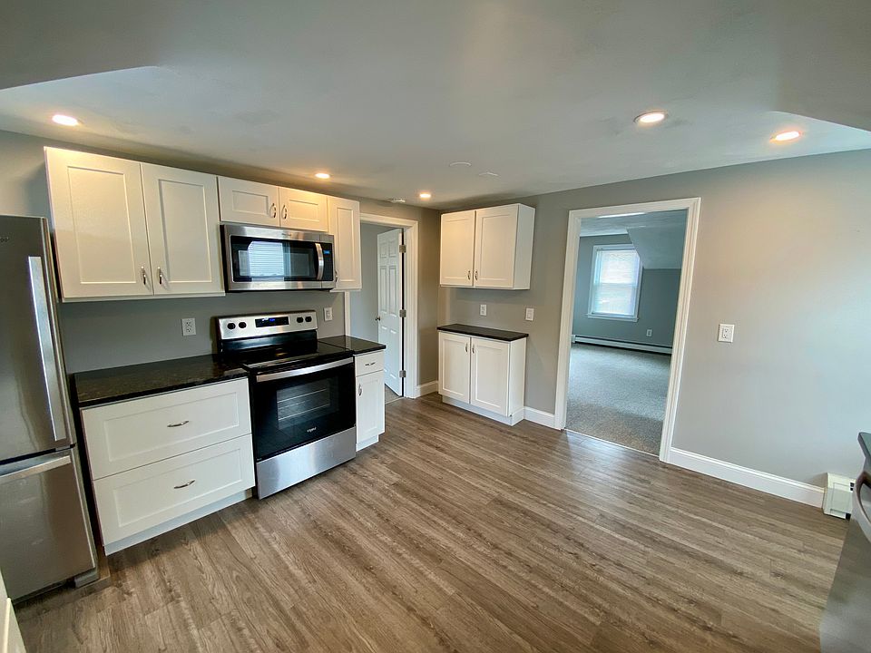 Updated kitchen with stainless steel appliances.
