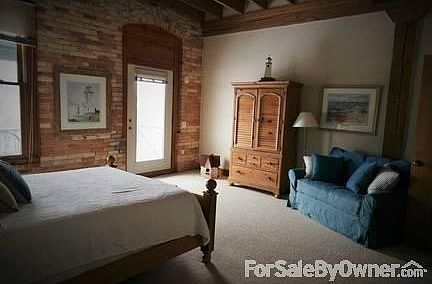 Master bedroom suite
						:
						Master suite has a balcony that overlooks the city marina and channel