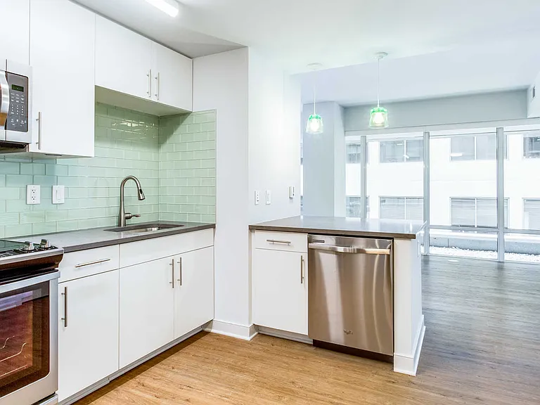 Kitchen with Quartz Countertops and Stainless Steel Appliances