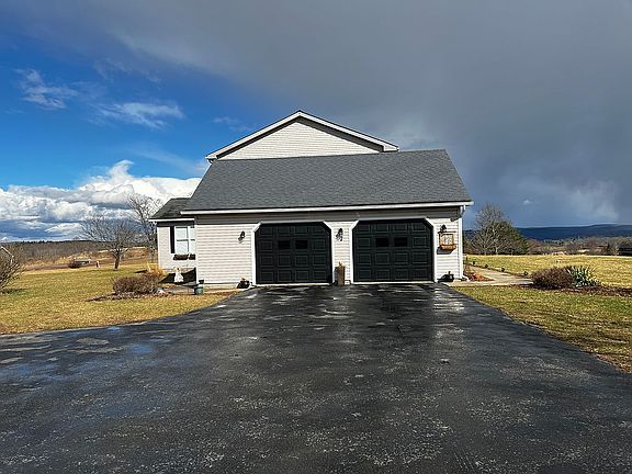 Drive way to two car-garage.
