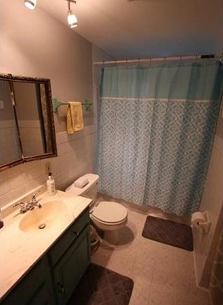 Tile floor's with in floor heat.  Lot's of room for storage as well.