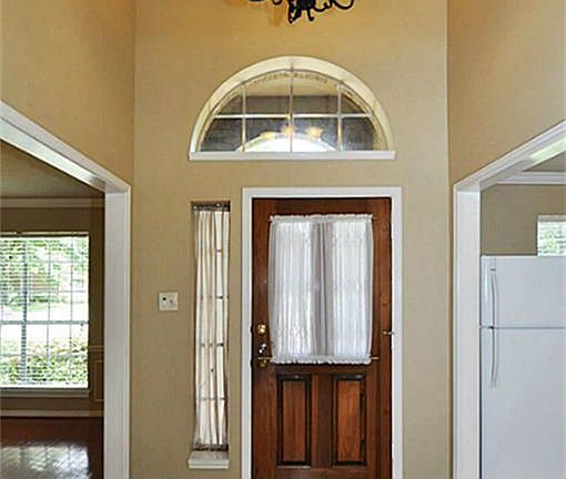UPGRADED WROUGHT IRON LIGHT FIXTURE AND TILE WITH MARBLE INLAY