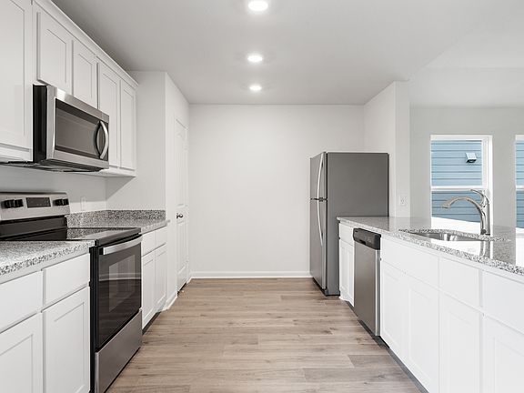 The kitchen of the Reed has energy-efficient appliances.