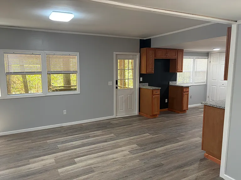 Looking toward the front door from living room.