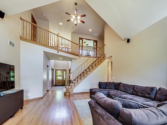 Huge ceilings give the home a light and airy feeling