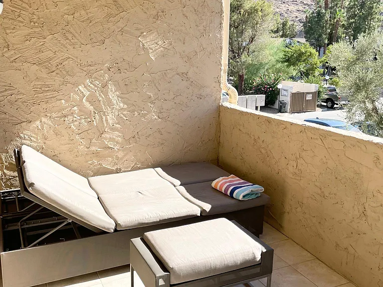 Large private patio. Crate & Barrel Outdoor Double Chaise Sofa Lounge overlooking Mount Saint Jacinto (West-facing view).