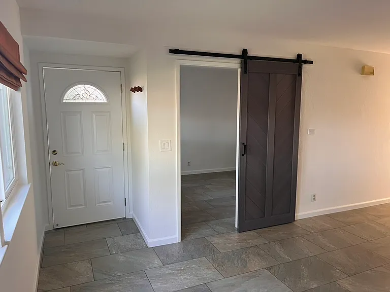 Entrance and bedroom/ office space on 1st floor