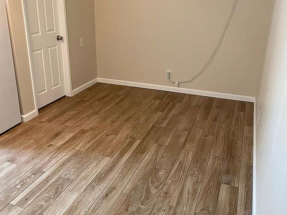 living room and bathroom entrance