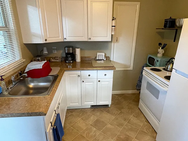 Kitchen with built in pantry and cabinetry.