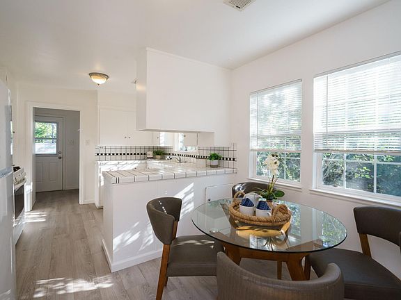 kitchen nook and kitchen (staged)