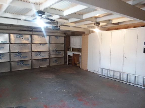 Spacious garage with tons of storage capability