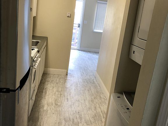 1826 has a dark wood floor