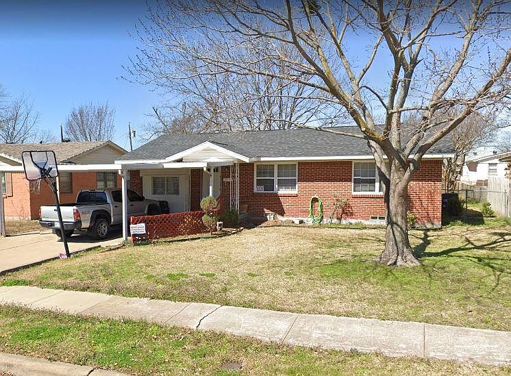 4 bedroom, 2 full bathrooms + Car port + huge shed
