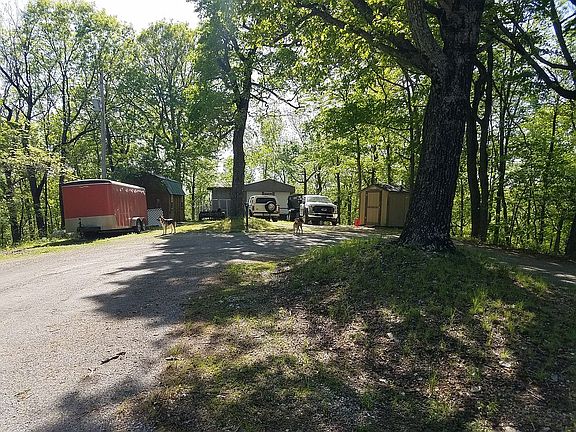 End of the cul-de-sac showing the home and  storage sheds