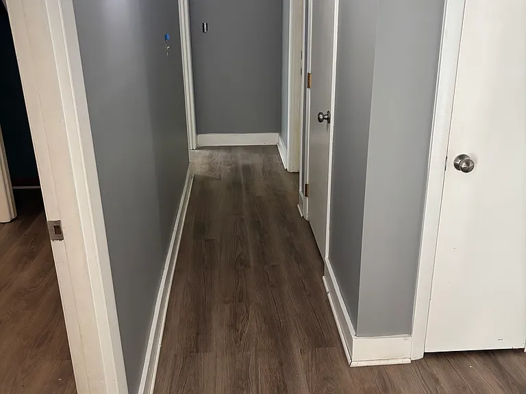 Fresh paint in hallway. First bedroom to left, second end of hall to left. Master end of hall to right.