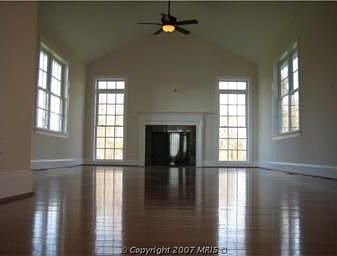 Family Room with valuted ceilings, marble fireplace 