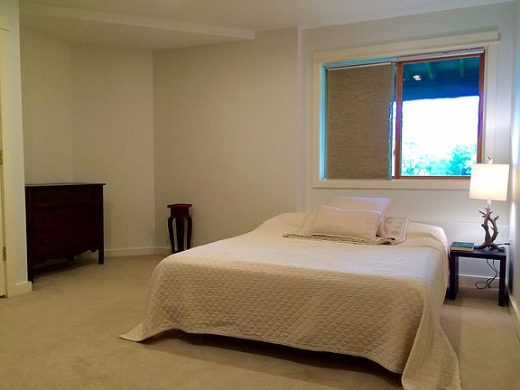 Bedroom w/ water view