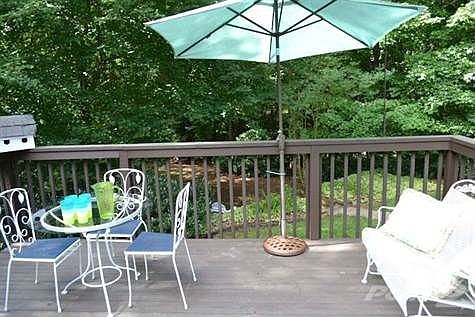 Deck Overlooking Private Back Yard