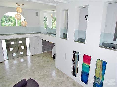 Spacious Welcoming Foyer With Marble Tile Floors