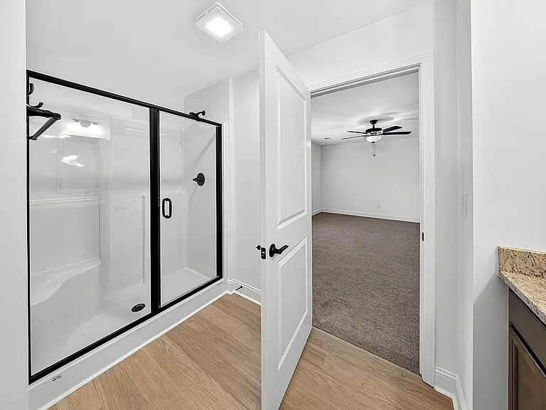 Primary shower with custom glass door